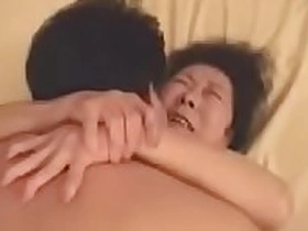 Japanese granny enjoying sex