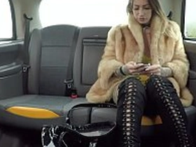 Fake Taxi Ava Austen rails a big black vibrator on the backseat
