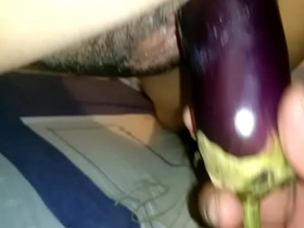 Fucking my wife with a chubby eggplant