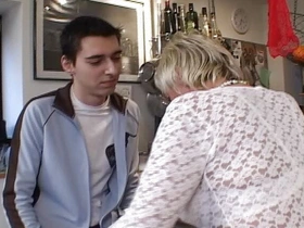 Blonde German granny gets her pussy pleased by a young stud