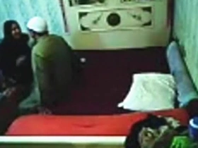 Voyeur tapes an arab hijab girl having missionary coition with a guy mainly the bed