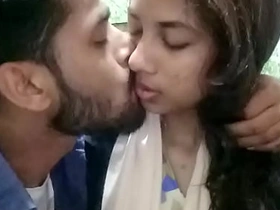 Sylheti girl kissing in restaurant