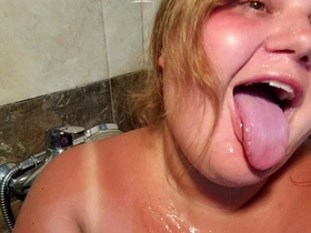 Beautiful tanned topless cookie with big tits acquires mammoth cum on her beautiful exposure coupled with mouth yon the shower