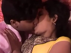 Sexy indian aunty giving a kiss in day